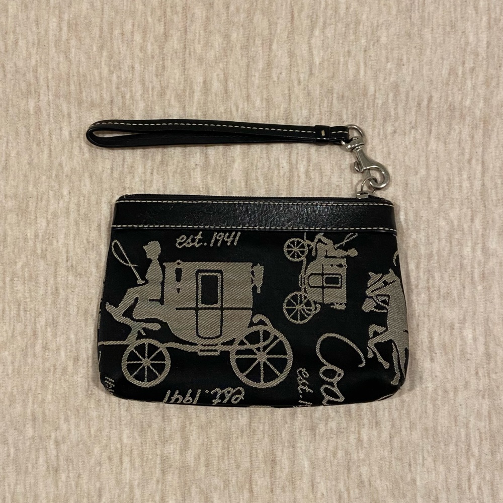 Coach black and gray wristlet with horse and carriage print